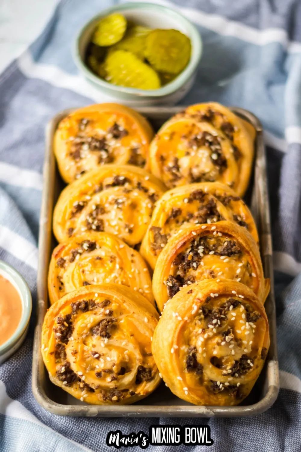 These Big Mac pinwheels roll all the classic burger flavors into a fun, handheld bite. Crescent roll dough is filled, rolled up, and baked until golden and flaky, making them perfect for parties, game day, or anytime you want an easy appetizer that feels familiar and fun.