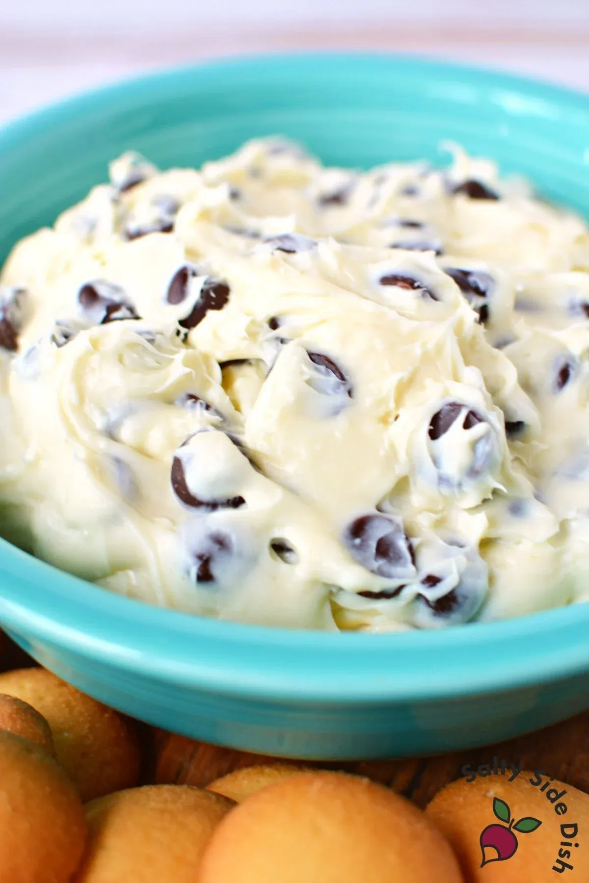This cream cheese chocolate chip dip tastes just like cheesecake and disappears fast. Loaded with mini chocolate chips and rich, creamy goodness, it’s perfect for scooping up with graham crackers, cookies, or fresh fruit. An easy dessert dip that’s guaranteed to have everyone asking for the recipe.