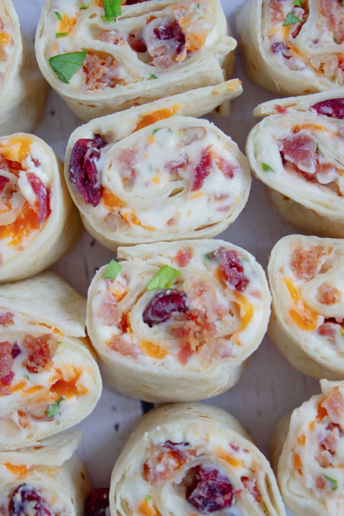 These cranberry cream cheese pinwheels are simple, festive, and perfect for easy entertaining. Made with just a handful of ingredients, they come together quickly and make a great grab-and-go appetizer for parties, holidays, or any gathering where finger food is a must.
