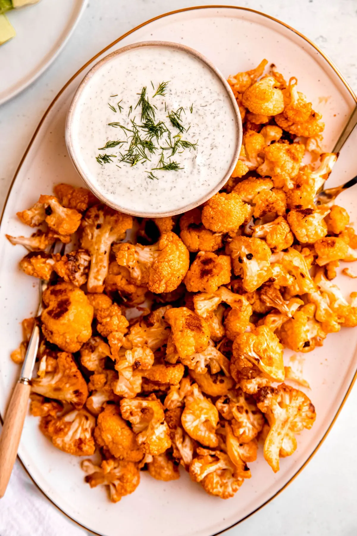 These roasted buffalo cauliflower bites are perfect when you’re craving wings but want something veggie-packed too. Crispy on the outside, tender on the inside, and tossed in classic buttery hot sauce, they hit that sweet spot between feel-good food and game day indulgence. Great for snacking, sharing, and satisfying both cravings at once.