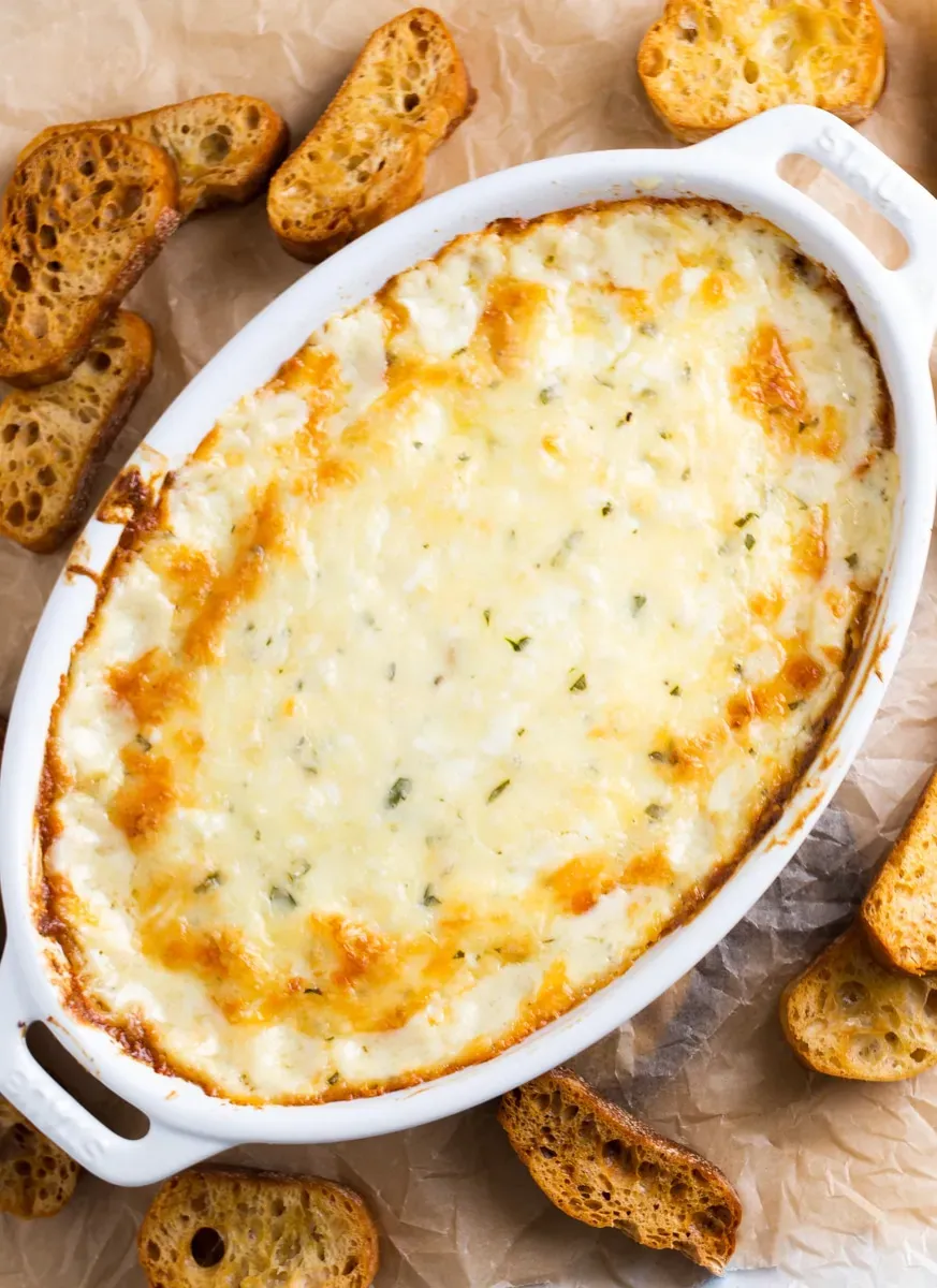 This garlic bread dip is easy to prep, easy to bake, and easy to love. Everything comes together in one pan with minimal cleanup, using simple ingredients to create a hot, cheesy dip packed with classic garlic bread flavor. Perfect for game day, parties, or any gathering, it’s especially kid-friendly and guaranteed to disappear fast.