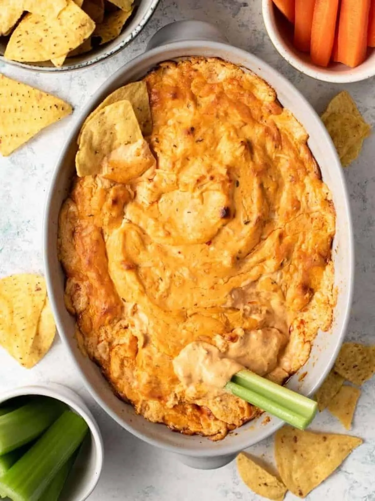 If you love buffalo chicken wings, this creamy, cheesy dip is basically that—only spoon-able, shareable, and dangerously hard to stop eating. It comes together with just a handful of ingredients and a couple of easy steps, so it’s perfect when you need something quick for game night or a snack table that everyone will hover around. Warm, melty, and loaded with flavour… it’s the kind of appetizer that vanishes before you even get comfy on the sofa.