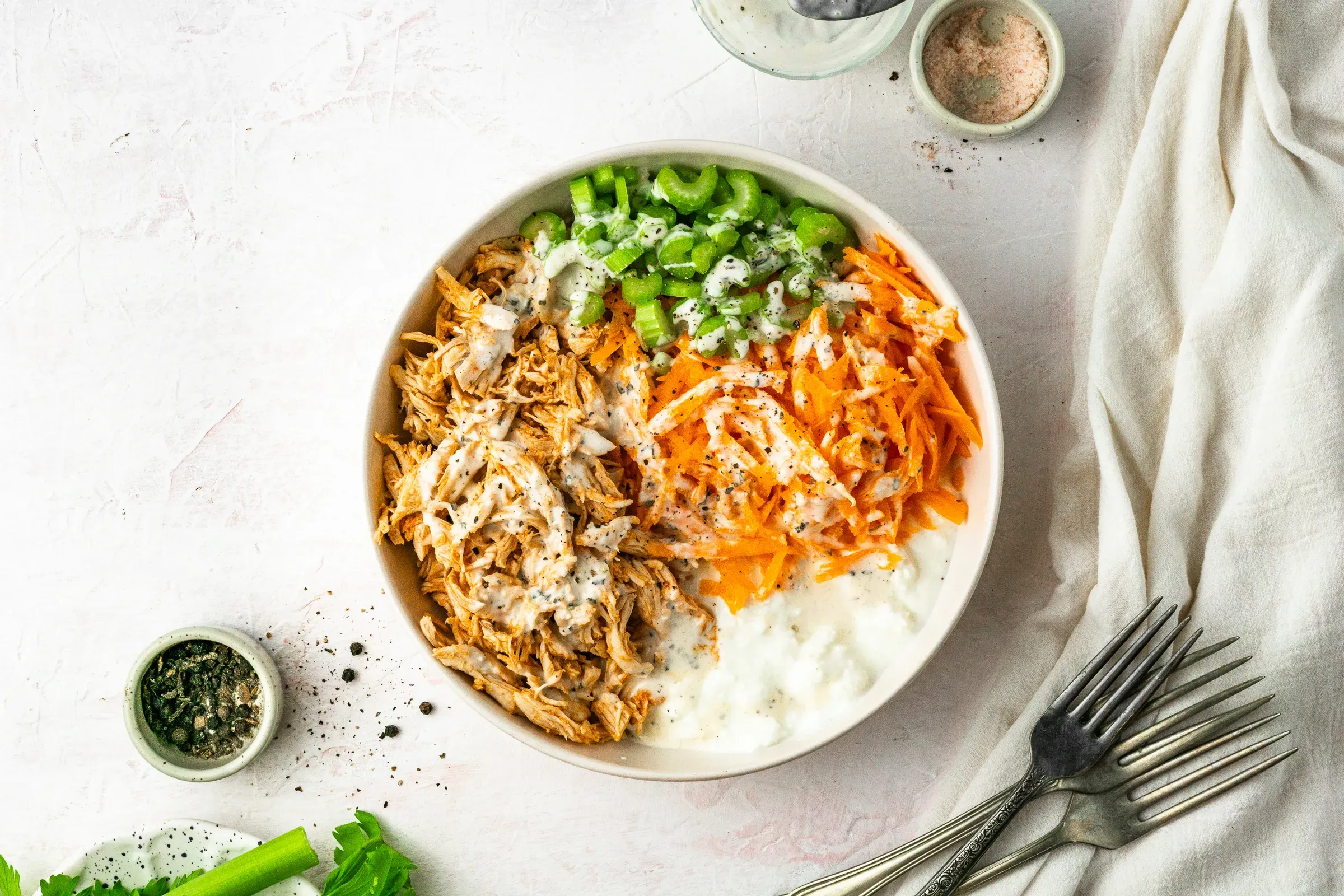 The buffalo chicken cottage cheese bowl is one of those lunches that feels a little clever in the best way. You get tender buffalo-spiced chicken, cool and creamy cottage cheese, and just enough heat to keep things interesting, all in one super satisfying bowl. It’s quick to throw together, easy to prep ahead, and works just as well for a fast lunch as it does for a light dinner. The contrast between the spicy chicken and the creamy cottage cheese is what really makes this one shine — simple, filling, and surprisingly comforting.