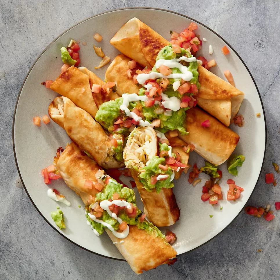 Flautas are our new favorite obsession. Made with shredded chicken wrapped in flour tortillas and then pan-fried, they’re somewhere between taquitos and chimichangas. They come together quickly, making them the perfect party appetizers or easy chicken dinner served alongside your favorite sides (we’re looking at you, rice and beans). 
