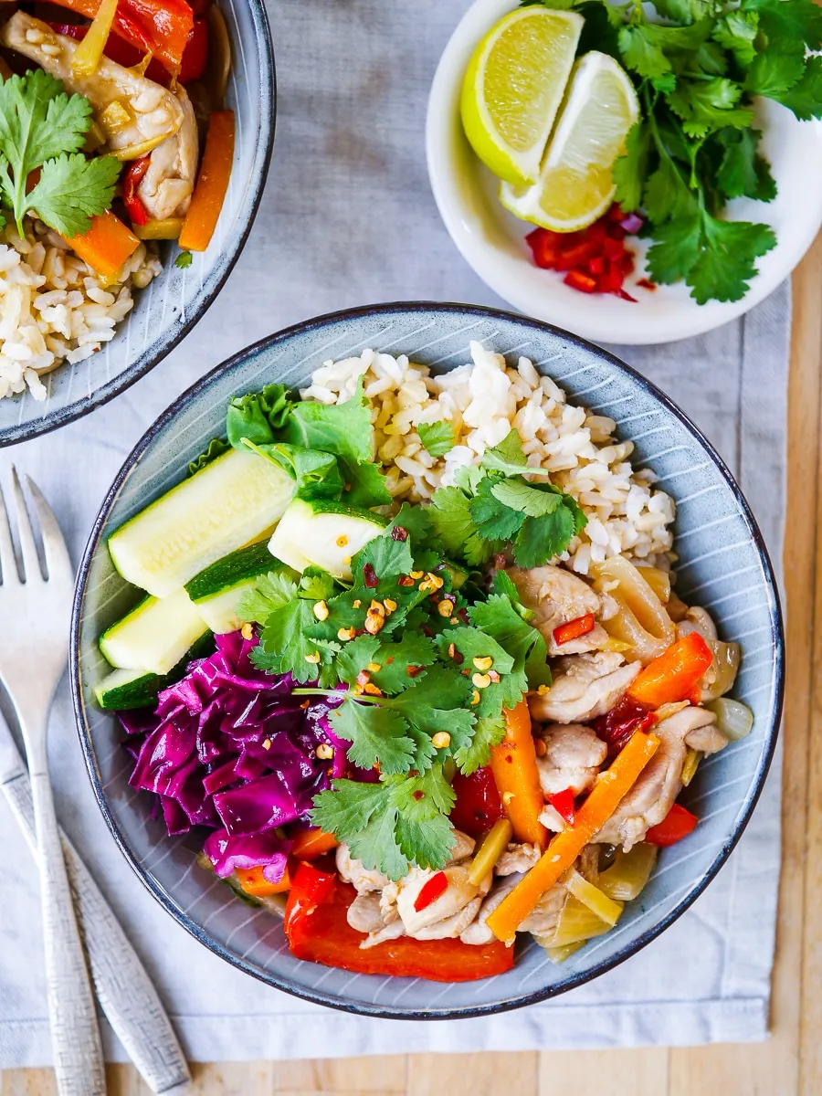 These ginger chili chicken rice bowls are full of bold flavor made with simple, real-food ingredients. With tender chicken, fluffy rice, and a lightly sweet, savory sauce, they’re a great option for quick, family-friendly dinners or make-ahead lunches.