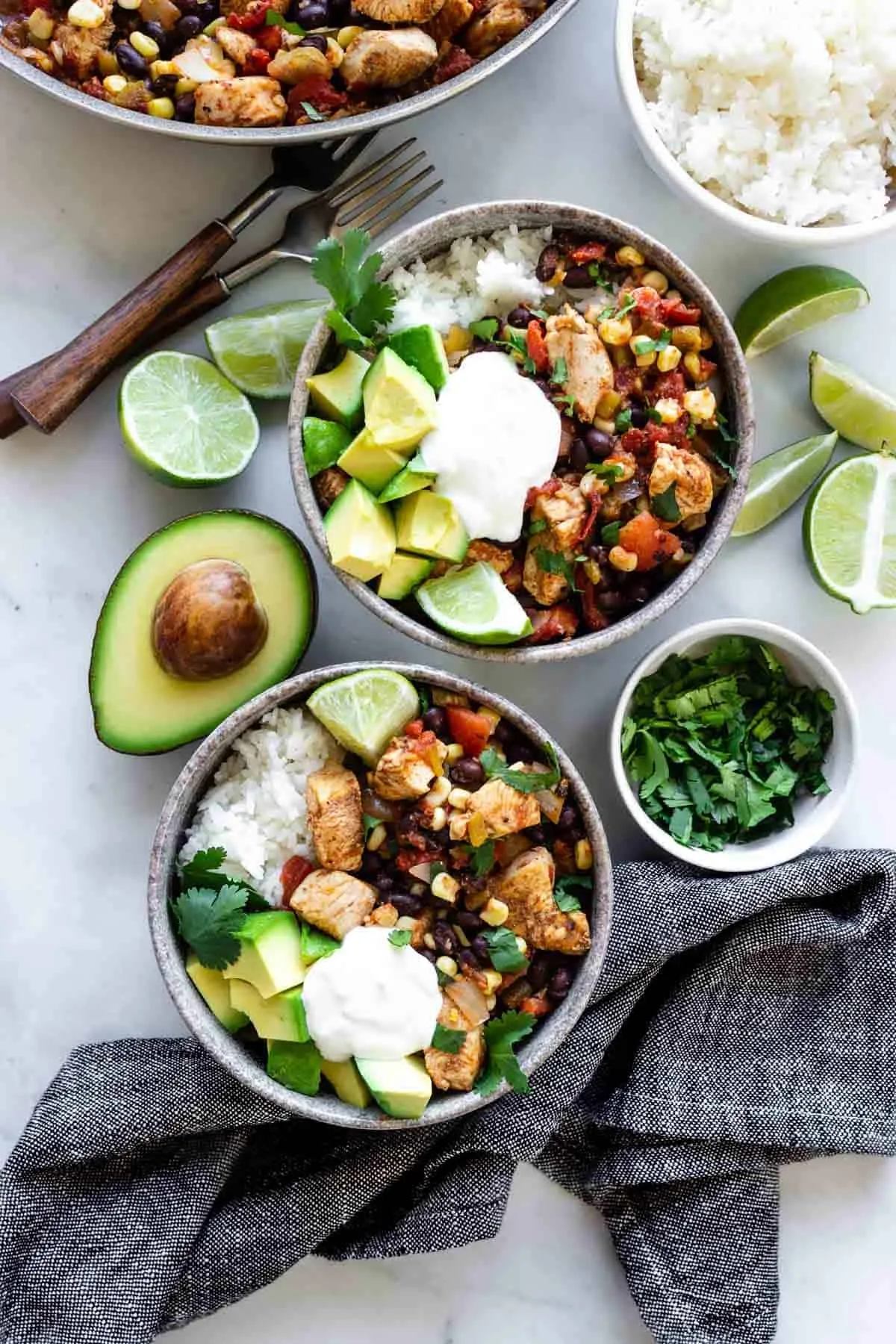 This chicken rice bowl comes together in about 20 minutes using simple, wholesome ingredients and bold southwest flavors. With tender chicken, fire-roasted tomatoes, black beans, green chiles, and corn served over rice, it’s comforting without being heavy. Add your favorite toppings like avocado, sour cream, cilantro, and a squeeze of lime, and you’ve got an easy dinner that also works beautifully for meal prep.