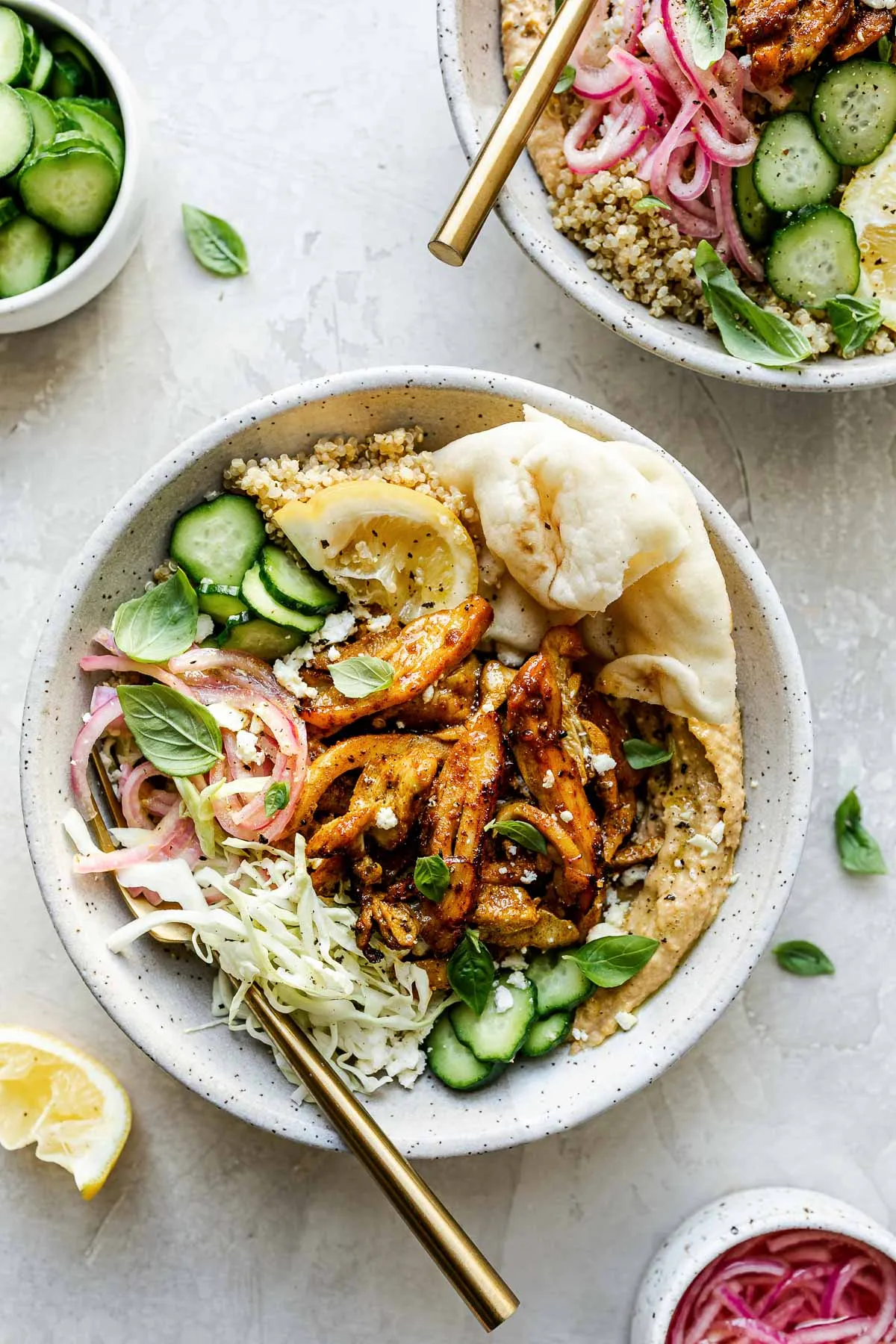 These hummus bowls are built around creamy hummus and topped with spiced chicken shawarma (or roasted veggie shawarma for a plant-based option), then finished with whatever toppings you love most. Think fluffy quinoa, crunchy cabbage, tangy pickled red onions, and a little feta for extra richness. They’re easy enough for weeknight dinners, ideal for meal prep, and flexible enough to suit vegetarian, vegan, or dairy-free eaters without feeling like a compromise.