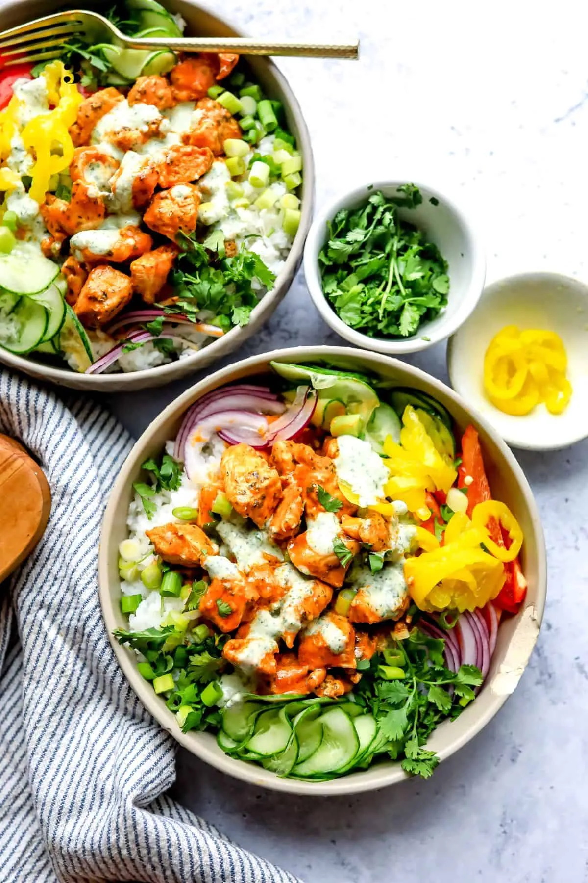 These Buffalo Chicken Bowls are packed with bold, saucy flavor and loads of colorful veggies, making them just as fun to eat as they are easy to make. Everything comes together with a creamy homemade ranch that balances the tangy buffalo sauce perfectly, creating a bowl that feels both comforting and fresh. It’s the kind of dinner that works for busy weeknights, meal prep, or anytime the whole family wants something exciting in a bowl.