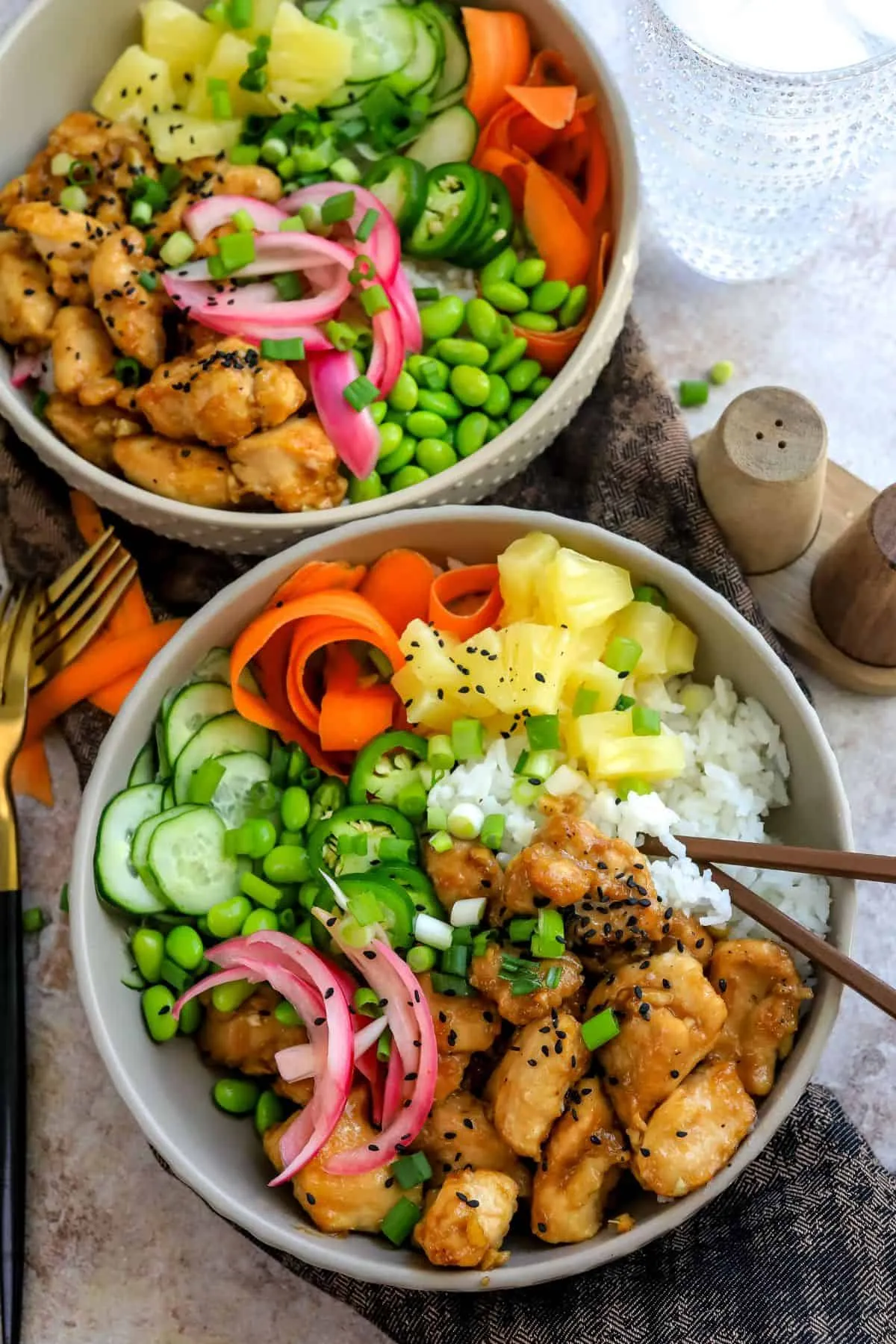These chicken poke bowls deliver all the fresh, colorful flavors you love—without relying on raw fish. Cooked chicken is coated in a savory garlic-ginger soy sauce, then paired with crisp veggies and classic poke-style toppings for a bowl that feels vibrant and satisfying. It’s a more affordable, approachable take on poke that works beautifully for easy dinners or make-ahead lunches, especially when you want something fresh but still full of flavor.