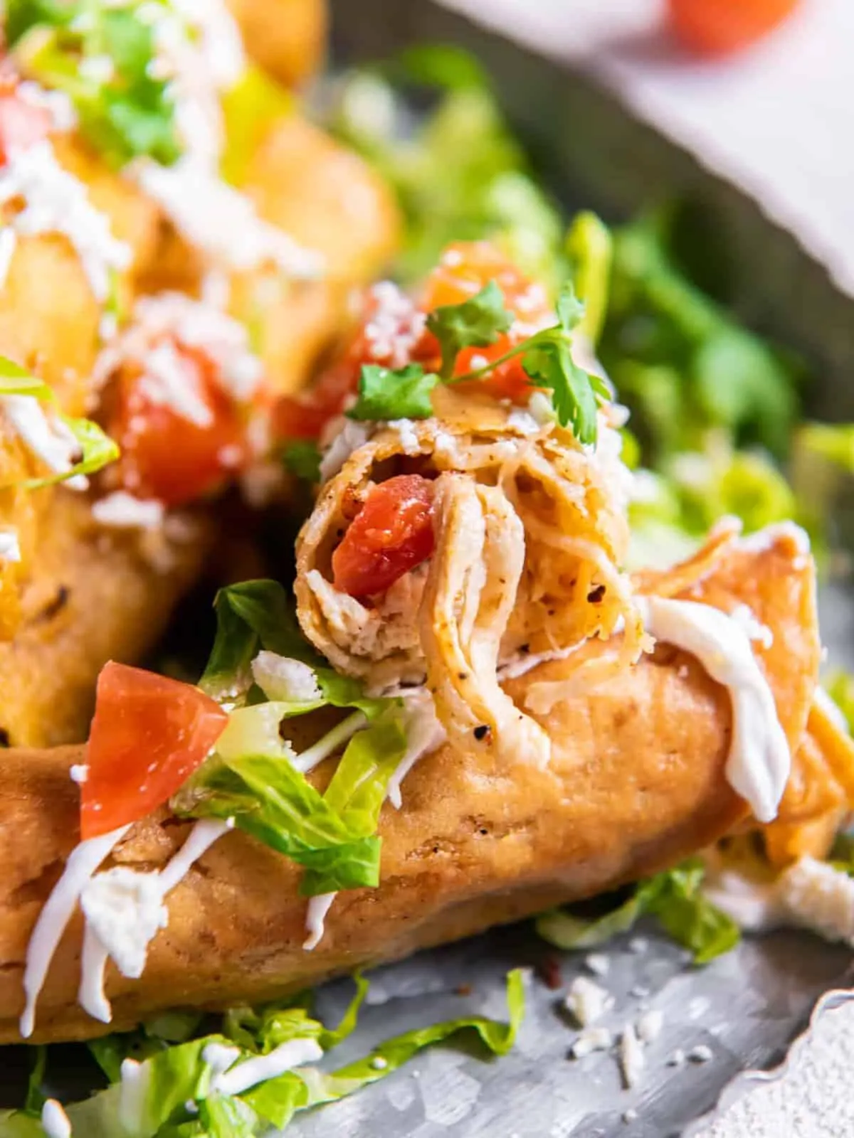 These homemade chicken taquitos are quick to make with leftover or shredded chicken. Fry 'em, bake 'em, or Air fry 'em up to crispy perfection! This simple Mexican appetizer is always a hit.