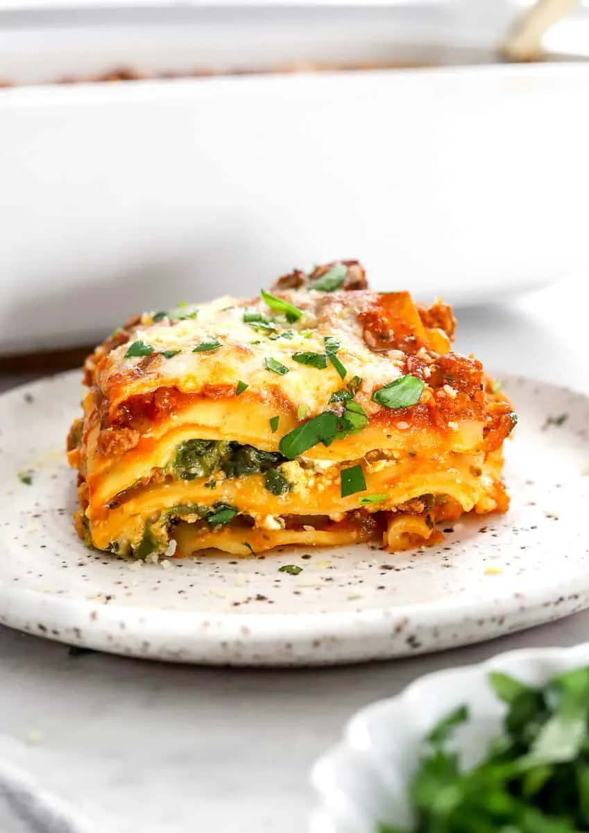 This cottage cheese lasagna is a lighter, protein-packed twist on the classic comfort dish. With layers of hearty meat sauce, tender noodles, creamy cottage cheese, and pops of spinach, it’s rich and satisfying without feeling too heavy. Cozy, filling, and perfect for family dinner night, it’s the kind of meal everyone goes back for seconds of.