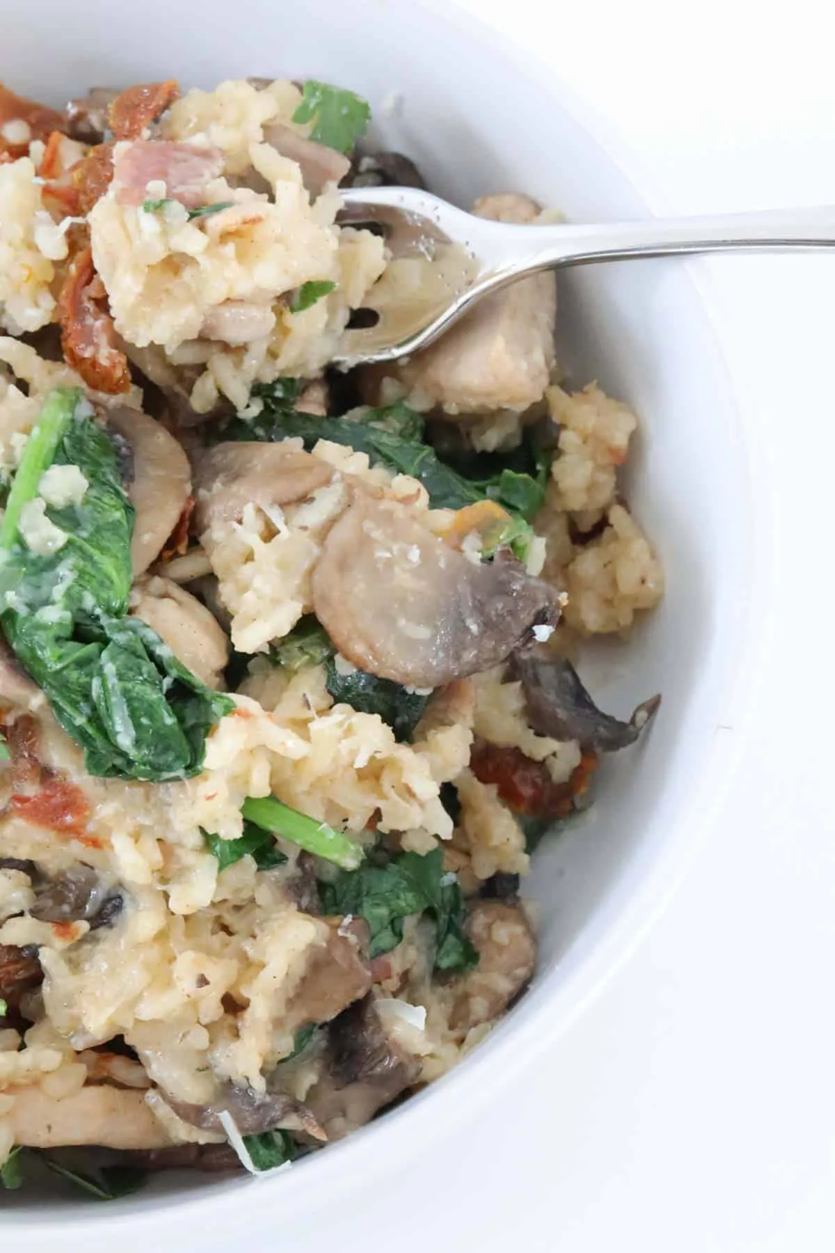This slow cooker chicken and mushroom risotto is the ultimate hands-off comfort food. Tender chicken, golden mushrooms, smoky bacon, and plenty of Parmesan cook together into a creamy, cozy dinner that practically makes itself. With minimal effort and big, family-friendly flavor, it’s perfect for nights when you want something warm and satisfying without standing over the stove.
