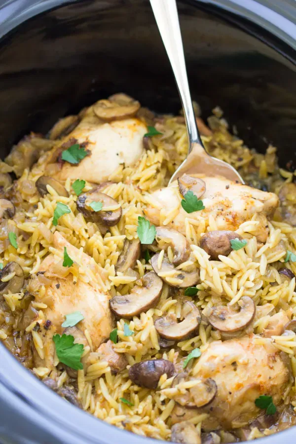 This crockpot chicken and mushrooms with orzo is an easy, cozy weeknight dinner. Tender chicken thighs, mushrooms, and soft orzo cook together in the slow cooker for a hearty, comforting meal that practically takes care of itself. Perfect for busy days when you want something warm and filling ready to go.