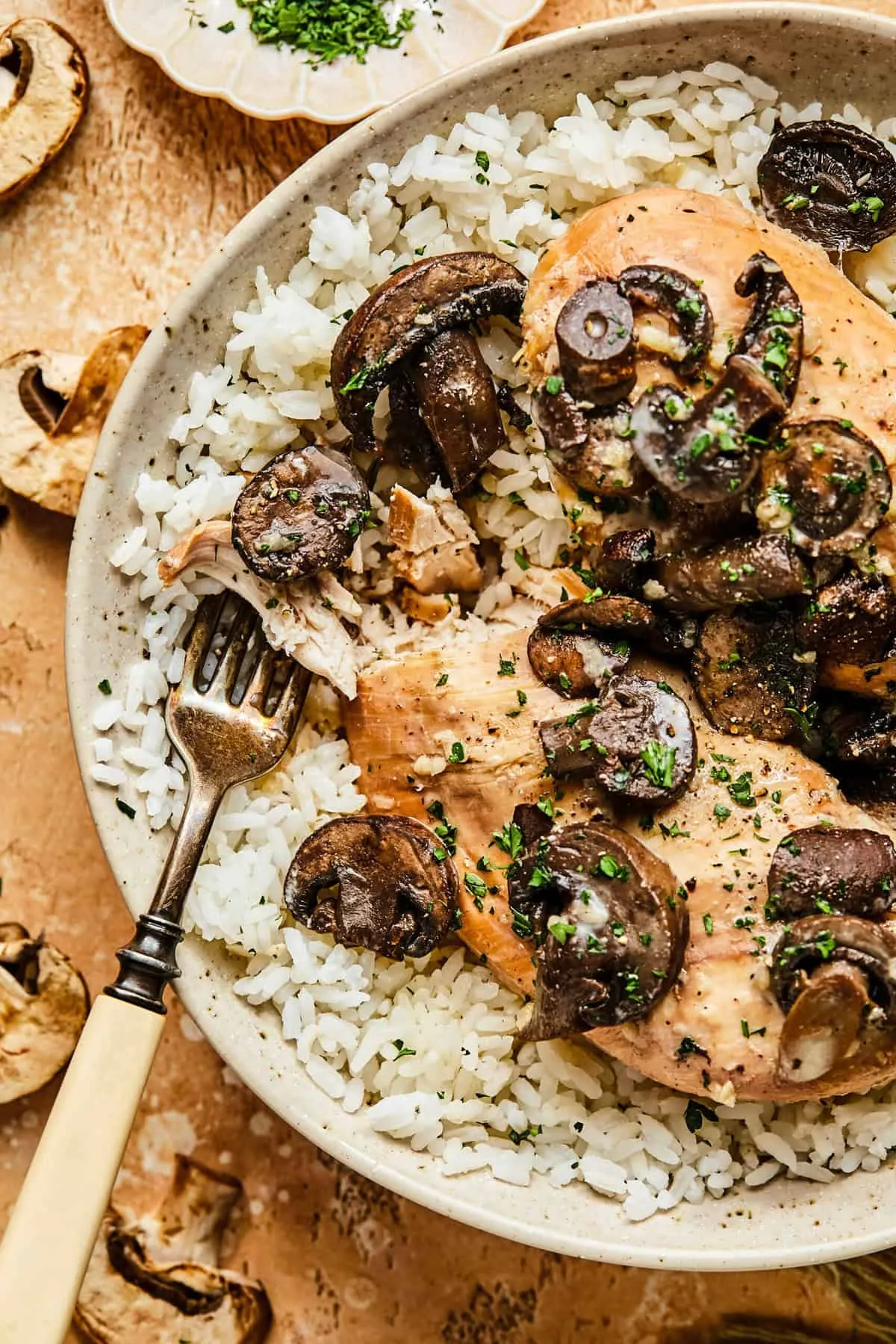 This slow cooker chicken Marsala is easy, cozy, and packed with flavor. Tender chicken simmers in a savory, garlicky sauce with plenty of mushrooms, making it a simple crockpot dinner that still feels a little special. Perfect for when you want something comforting without spending all day in the kitchen.