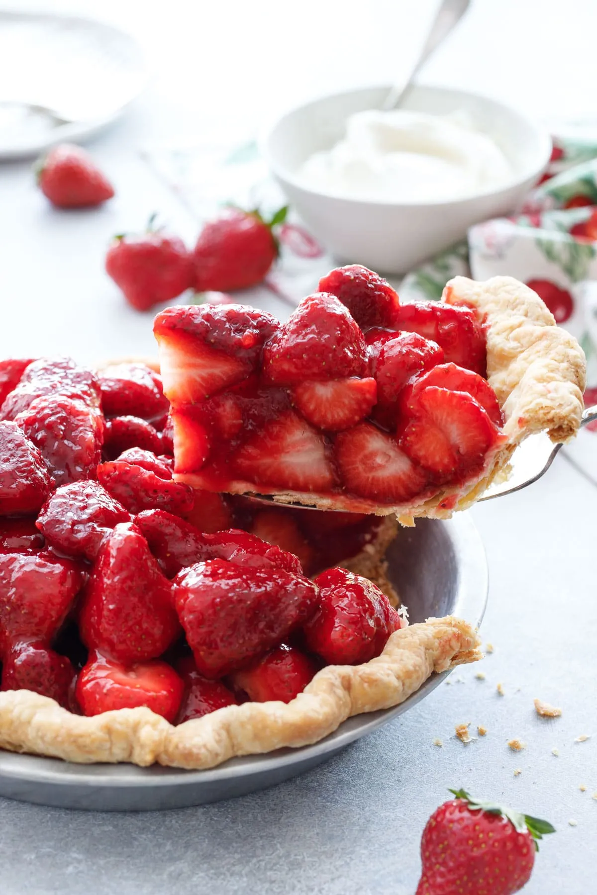 This fresh strawberry pie is bursting with ripe spring berries and a subtle hint of rose. The strawberries are left uncooked and gently set in a glossy strawberry filling, creating a bright, beautiful dessert that’s light, fresh, and perfect for warm-weather gatherings or special occasions.