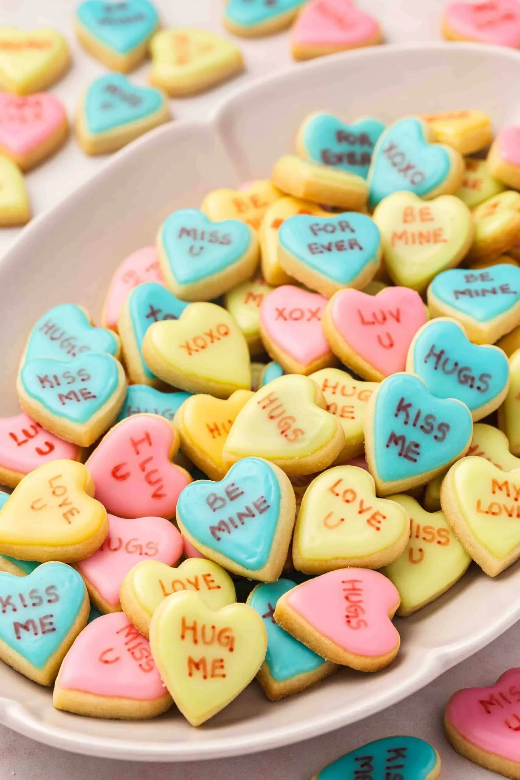 These mini conversation heart cookies are one of the cutest Valentine’s Day card swaps around. With pastel icing and playful little messages, each cookie feels like a sweet note of friendship and love. Perfect for sharing in classrooms, with friends, or anyone who appreciates a fun, edible Valentine.