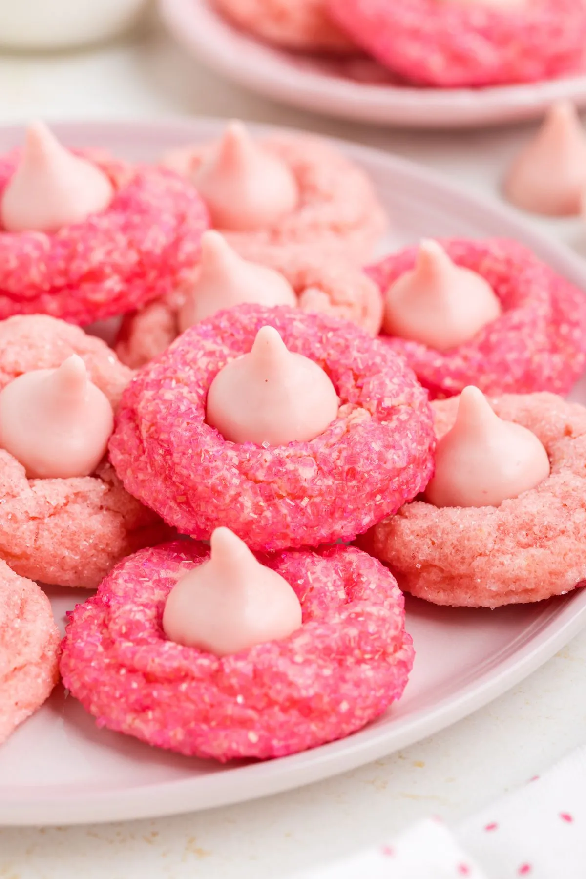 These pink Strawberry Kiss cake mix cookies are an easy, fun treat that comes together fast. Made with a box of cake mix and just a handful of simple ingredients, they’re soft, sparkly, and full of strawberry flavor. Perfect when you want something cute and homemade without a lot of effort.