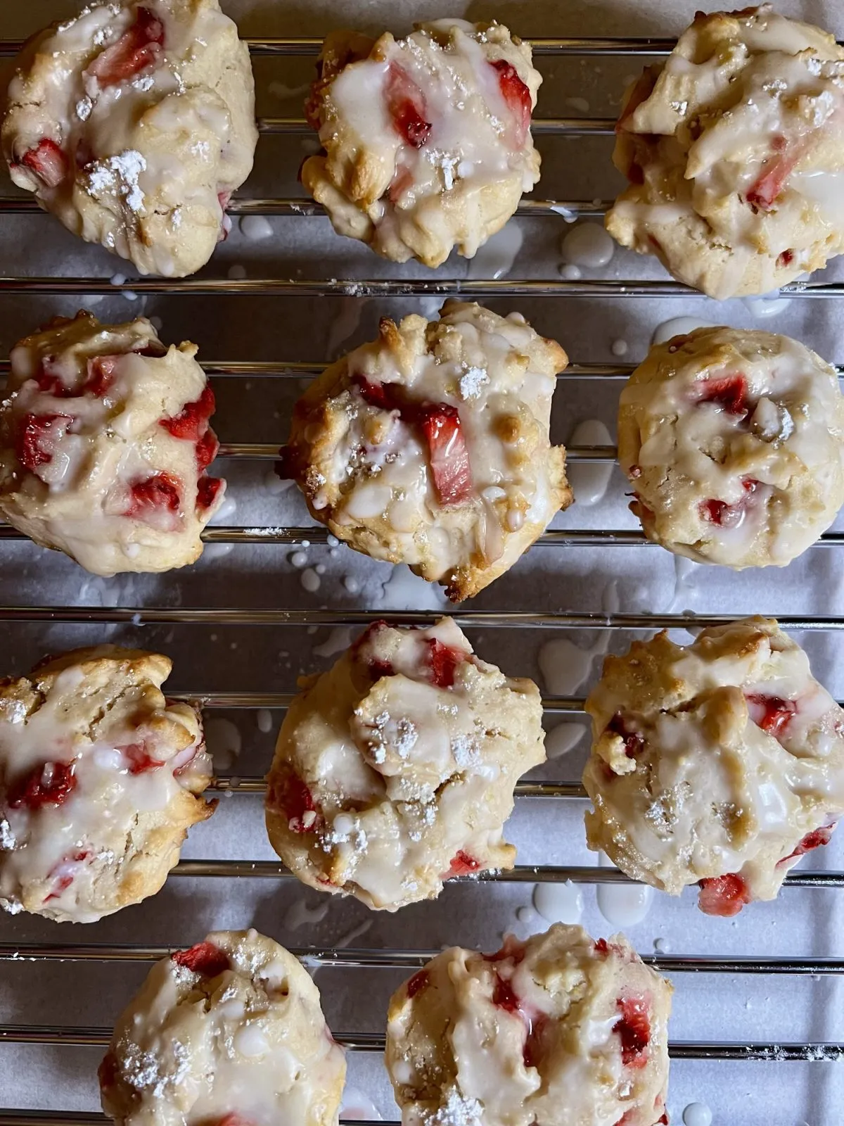 These strawberry scone cookies are a fun twist on a classic and surprisingly easy to love. Light, slightly crumbly, and finished with a drizzle of lemon icing, they taste like a little bite of summer. Perfect for using up extra strawberries, they work just as well for dessert, snacking, or a grab-and-go breakfast treat.
