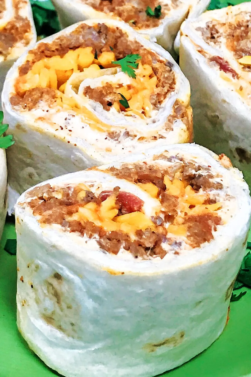 These taco meat pinwheels are a fun, crowd-pleasing twist on classic taco flavors. Seasoned taco meat is rolled up in soft tortillas and sliced into easy, bite-sized pieces that are perfect for sharing. A great choice for parties, potlucks, or anytime you need finger food that disappears fast.