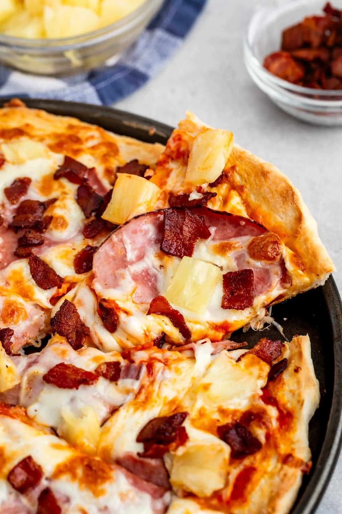 This easy homemade pizza is a sweet-and-savory classic, pairing juicy pineapple with melty cheese and crispy bacon. It’s simple to throw together, full of bold flavor, and a great way to ease pineapple skeptics into the combo. A fun, low-effort dinner that feels a little different without being complicated.