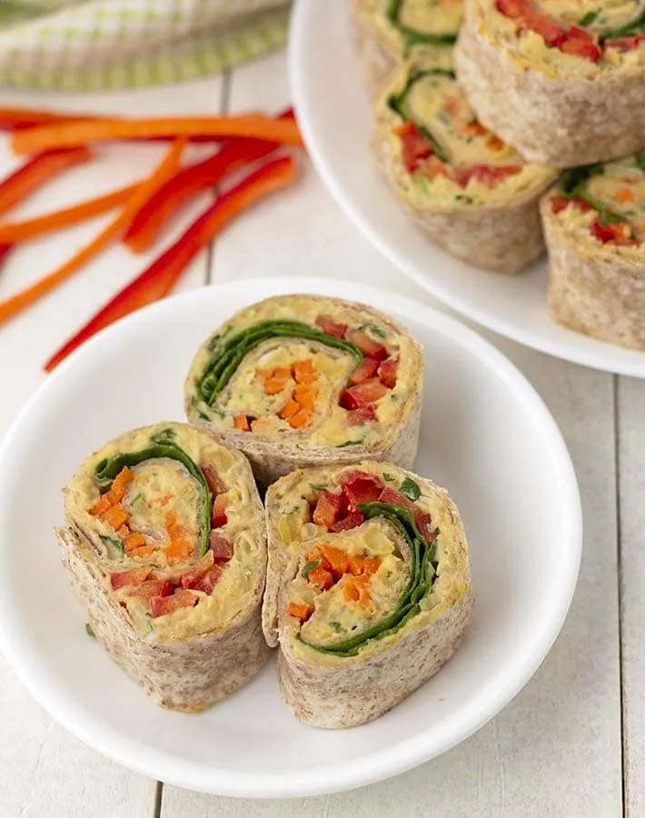 These savory vegan pinwheels are filled with a colorful mix of fresh vegetables and a simple, flavorful spread. Rolled up in soft tortillas and sliced into bite-sized pieces, they work beautifully as vegan appetizers for parties and potlucks, but are just as good for snacking or an easy lunch. Fresh, flexible, and perfect for make-ahead serving.