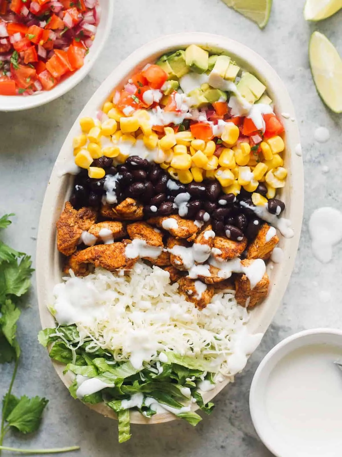 These copycat chicken burrito bowls bring all the bold, fresh flavors you love from a Chipotle-style bowl straight into your own kitchen — and honestly, they’re even better homemade. Juicy seasoned chicken, fluffy rice, and all those colorful toppings come together in under 30 minutes, making this one of those weeknight dinners that feels special without taking over your evening. Since everyone can build their own bowl, it’s perfect for picky eaters, busy families, and easy meal prep lunches you’ll actually look forward to eating.