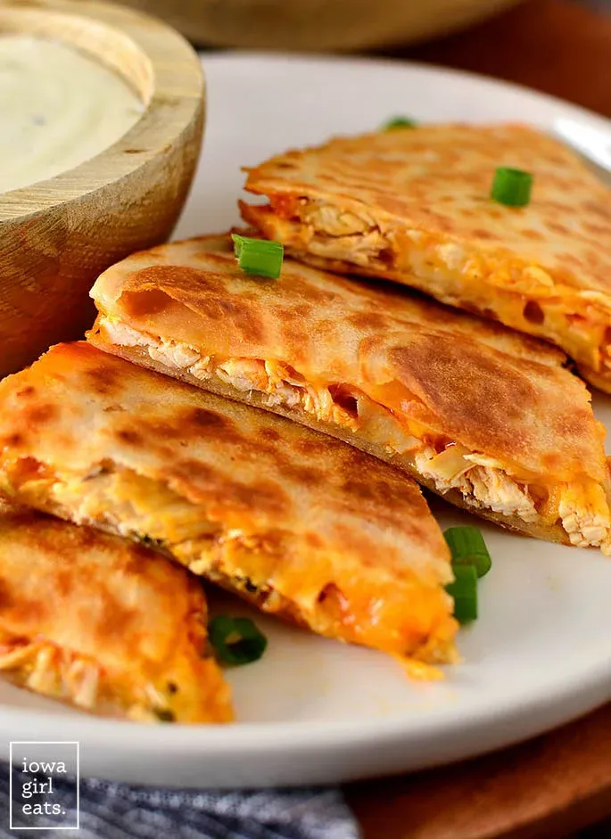 These buffalo chicken quesadillas are hot, cheesy, and perfectly crispy, making them a go-to when you’re craving bold flavor fast. They come together quickly and work just as well for an easy lunch as they do for a no-fuss dinner. A fun, flavor-packed option when plain quesadillas just won’t cut it.