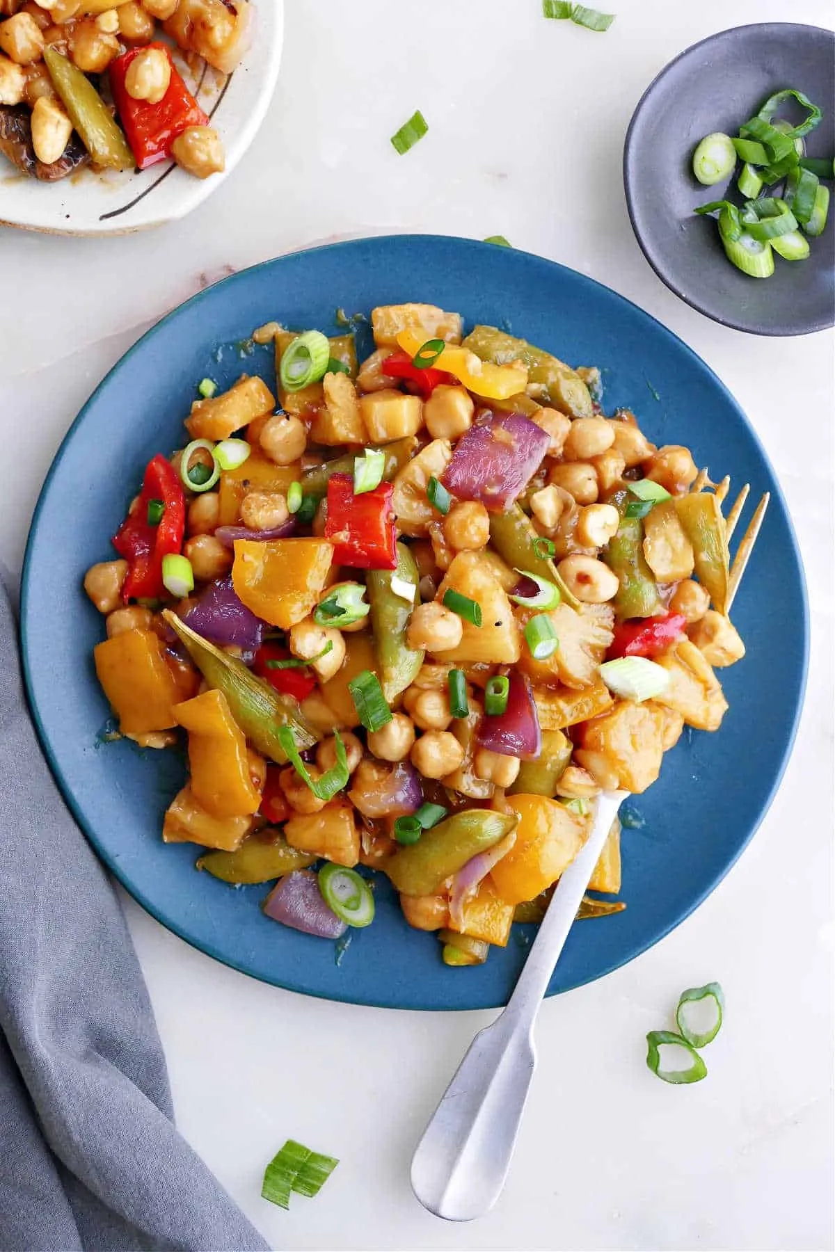 This pineapple chickpea stir fry is coated in a sticky, sweet-and-savory sauce made entirely from pantry staples, making it an easy vegan dinner that comes together in about 30 minutes. Bell peppers, snap peas, and crunchy cashews add plenty of texture, while the pineapple brings brightness and balance. A simple, flavor-packed meal that proves plant-based dinners don’t have to be complicated.