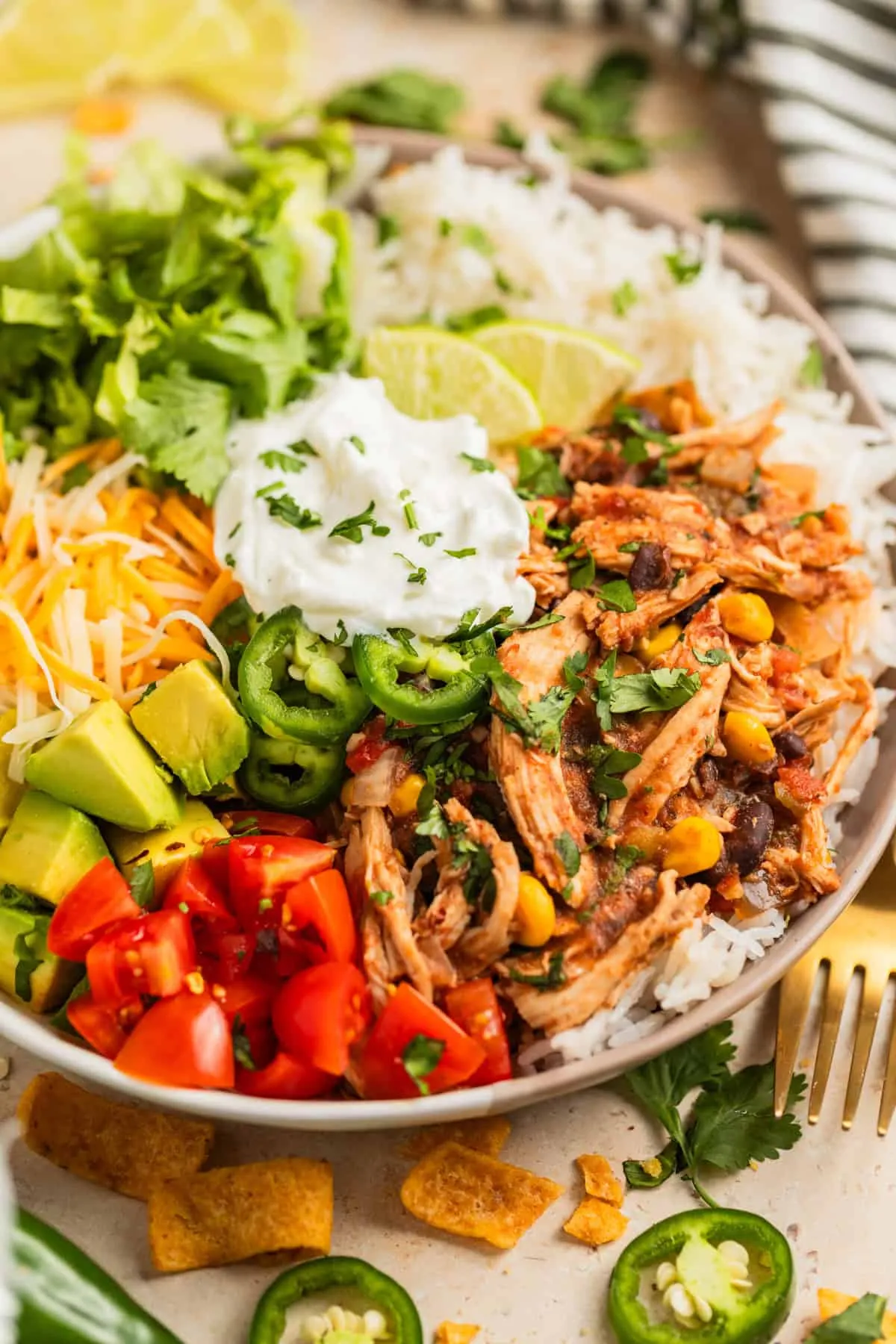 These slow cooker chicken burrito bowls are made for days when you want dinner handled with minimal effort. It’s a quick dump-and-go situation: juicy shredded chicken, black beans, and just the right amount of spice, all cooked low and slow while you get on with your day. They’re easy to customize with whatever toppings your crew loves and work beautifully for freezer meals or burrito bowl meal prep, which makes future-you very happy.