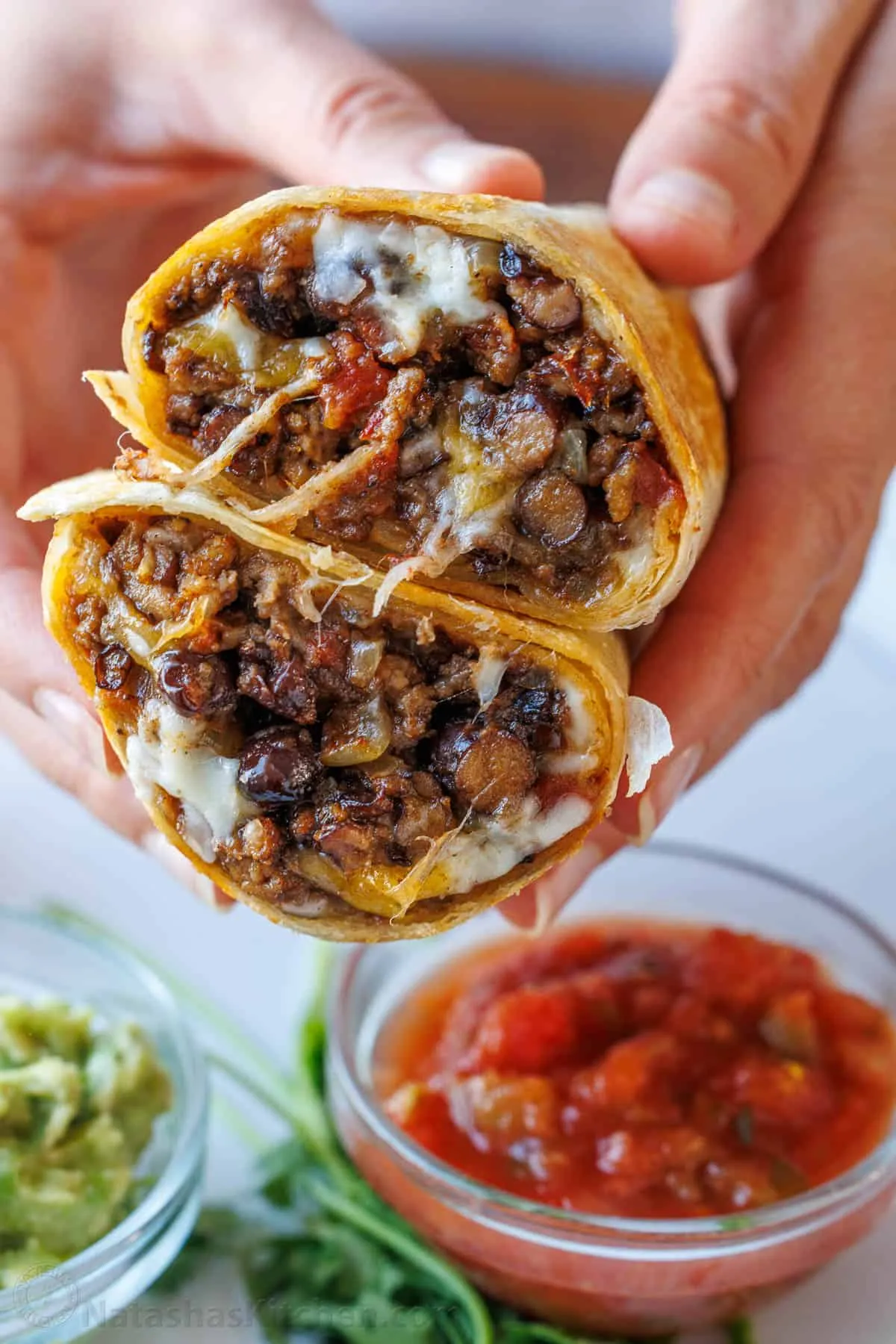 These classic beef burritos are filled with saucy, seasoned beef, beans, and melty cheese, then finished with your favorite toppings and wrapped in soft flour tortillas. They’re kid-friendly, easy to make, and work especially well for meal prep when you want dinners (or lunches) ready to go. A reliable, restaurant-style burrito that fits perfectly into a busy weeknight rotation.