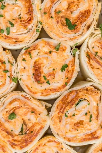 These pizza pinwheels are a fun, crowd-pleasing option made with cream cheese, pizza sauce, mozzarella, and pepperoni rolled up in a soft tortilla. They’re easy to make ahead and keep well in the fridge, which makes them perfect for quick lunches, party platters, or game day snacks. A familiar flavor combo that always disappears fast.
