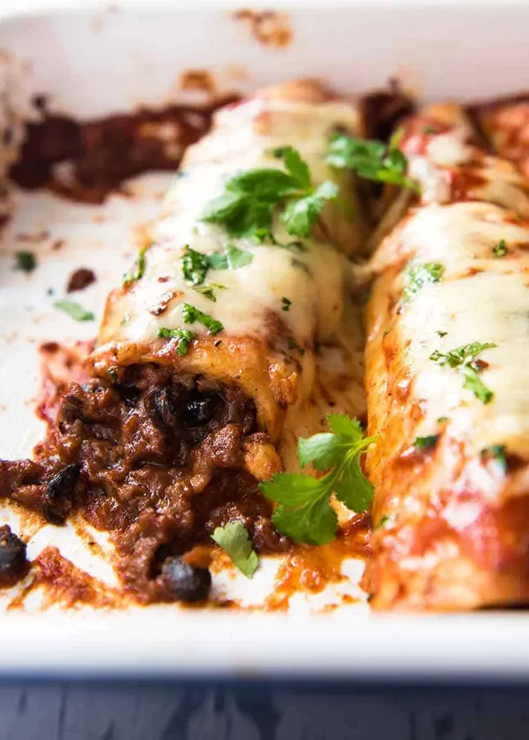 These beef enchiladas are loaded with a rich, flavorful filling and smothered in a homemade enchilada sauce for a truly comforting dinner. A simple time-saving spice mix pulls double duty in both the sauce and the beef, keeping prep easy without sacrificing flavor. A great go-to when you want classic enchiladas that feel hearty, cozy, and reliably delicious.