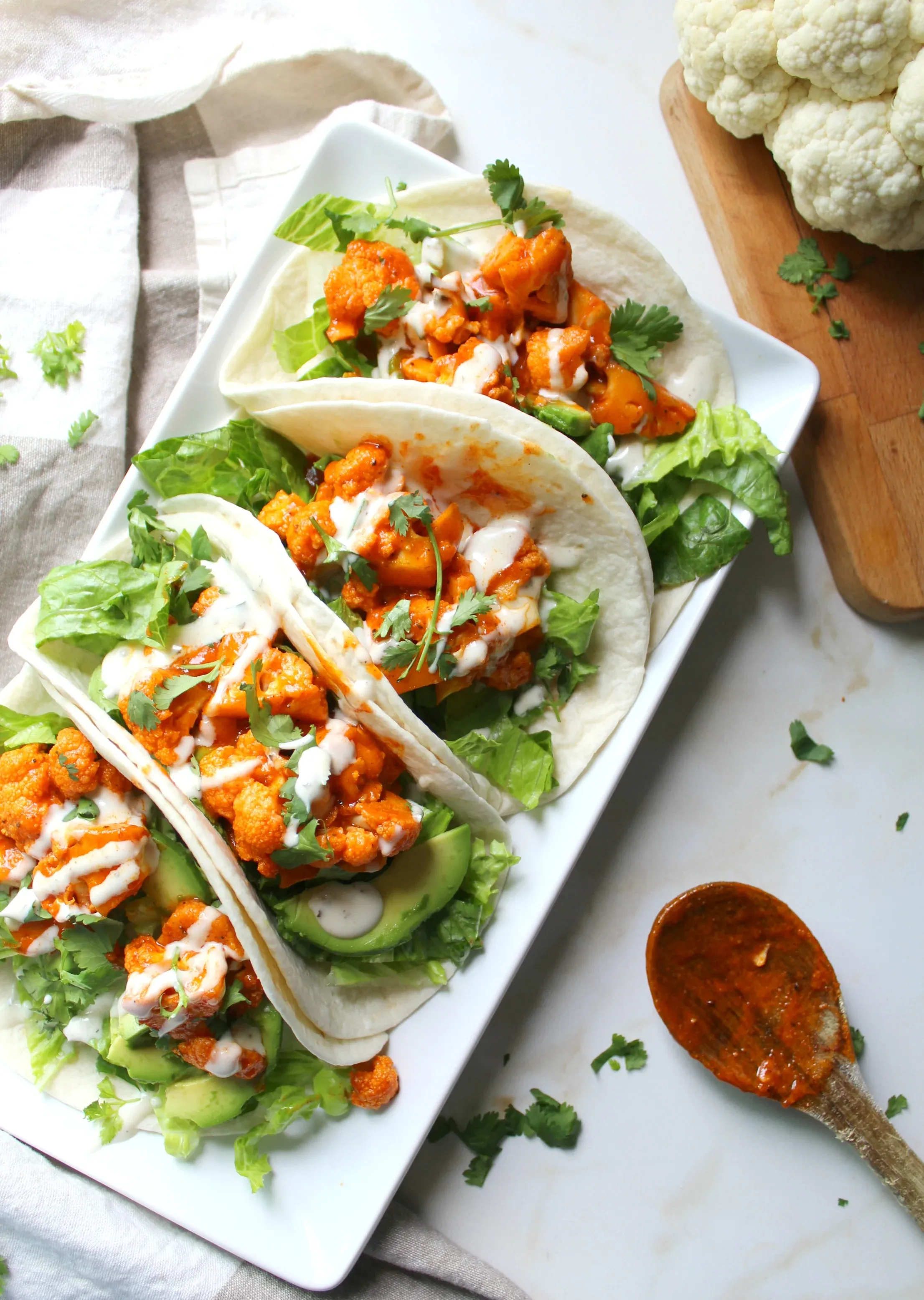 These soft tacos are loaded with spicy buffalo cauliflower, creamy ranch, crunchy romaine, and hearty avocado for a bold, satisfying bite. They bring plenty of heat and texture, making them a great plant-based addition to any soft taco recipes roundup — especially when you’re craving something fun and flavor-packed.