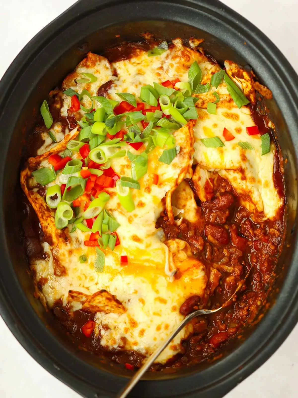 These slow cooker beef enchiladas are the ultimate low-effort fakeaway. There’s no browning required — everything goes straight into the slow cooker, letting the flavors do their thing while you get on with your day. The result is a rich, satisfying enchilada filling that’s perfect for an easy, hands-off dinner that still tastes like a treat.