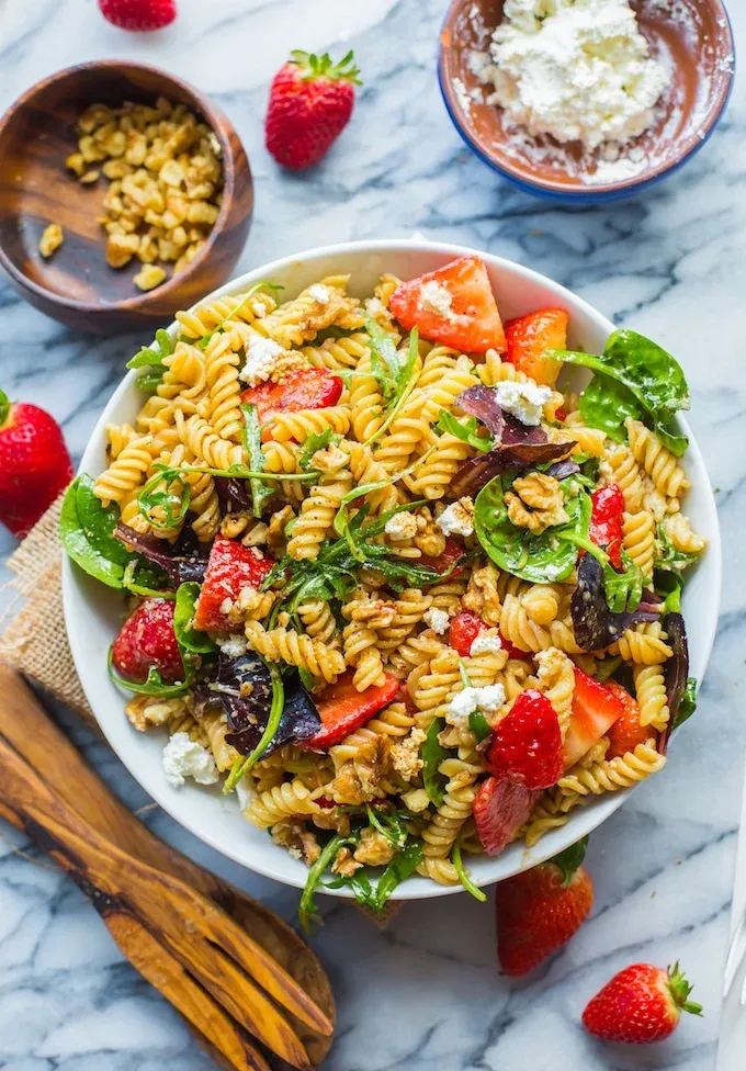 This balsamic strawberry pasta salad is fresh, lightly sweet, and full of texture. With tender pasta, juicy strawberries, crunchy walnuts, feta, and leafy greens, it comes together quickly and works beautifully as a summer side or light main dish.