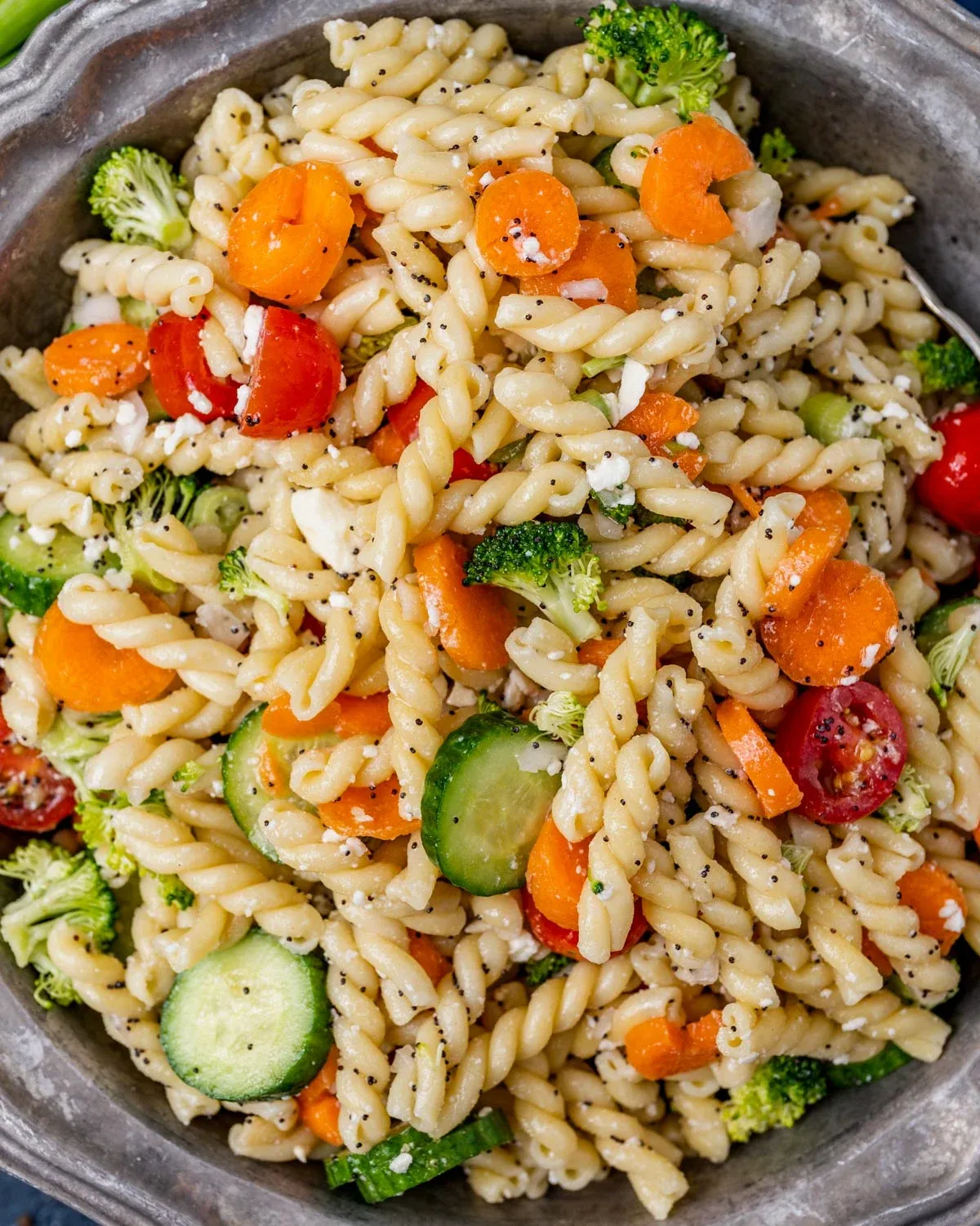 This poppyseed pasta salad is packed with fresh vegetables, feta cheese, and a lightly sweet, tangy poppyseed dressing. It’s a great choice for picnics, potlucks, and easy summer meals.