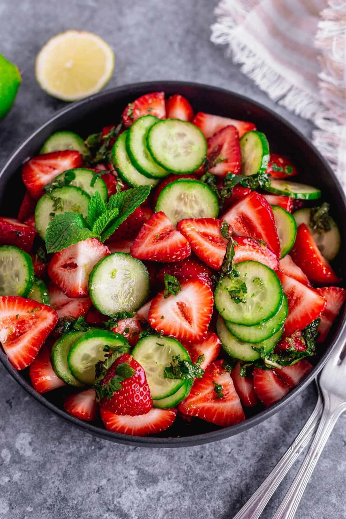 This strawberry cucumber salad is bright, fresh, and perfect for warm weather. Juicy strawberries and crisp cucumbers are tossed with a light lime-honey vinaigrette and fresh mint for a sweet, refreshing side that works beautifully for picnics, barbecues, or easy summer meals.
