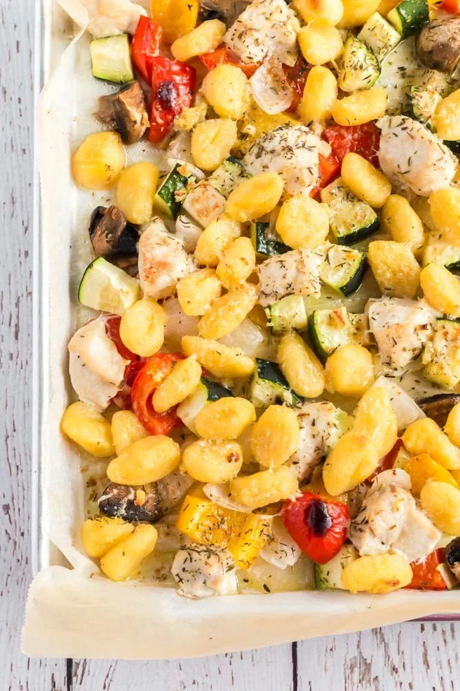 This chicken and gnocchi sheet pan dinner is an easy win for any night of the week. Tender chicken, pillowy gnocchi, and fresh vegetables roast together on one pan to make a complete meal with minimal prep and barely any cleanup.