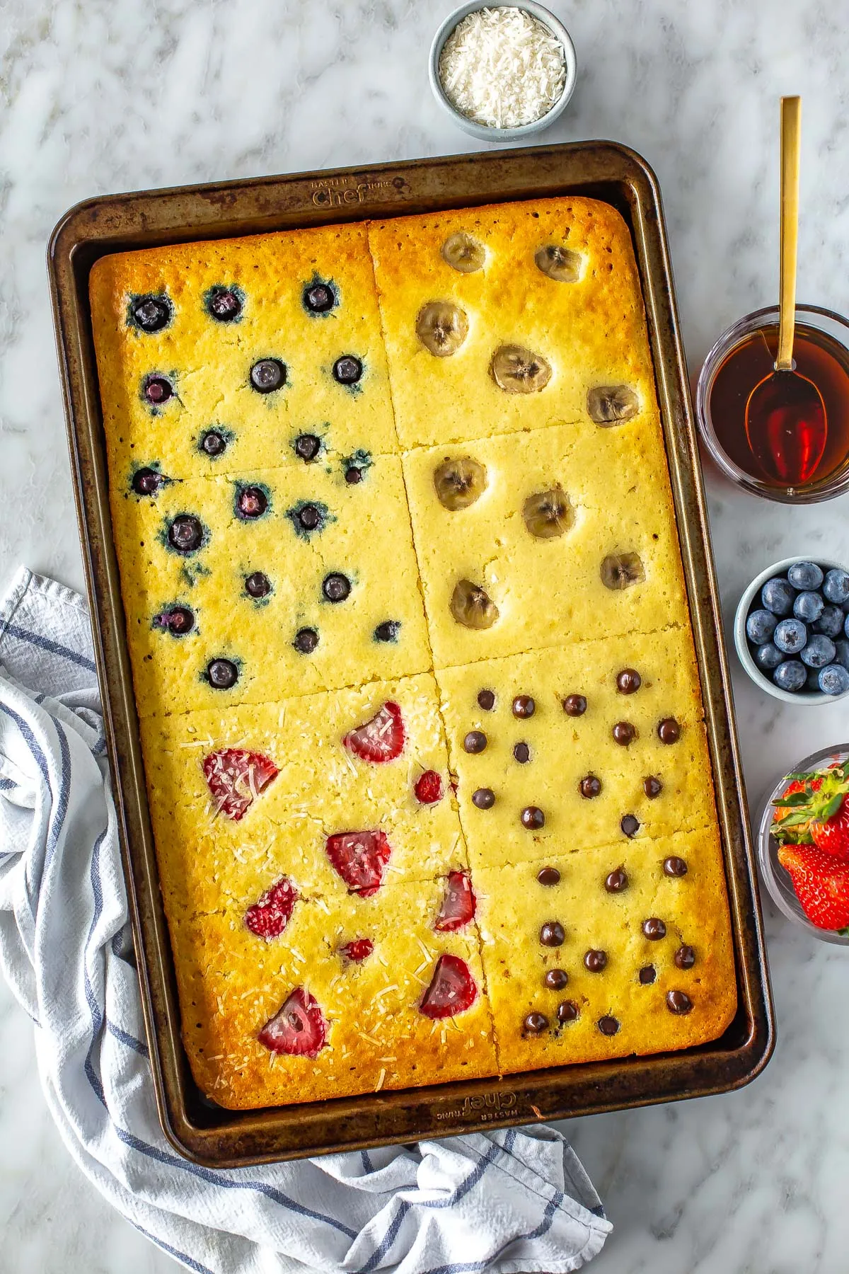 These sheet pan pancakes make breakfast for a crowd (or the week ahead) so much easier. Everything bakes at once in the oven, and you can mix and match toppings across the pan to keep everyone happy. Perfect for meal prep, busy mornings, or anytime you want pancakes without standing at the stove flipping batches.