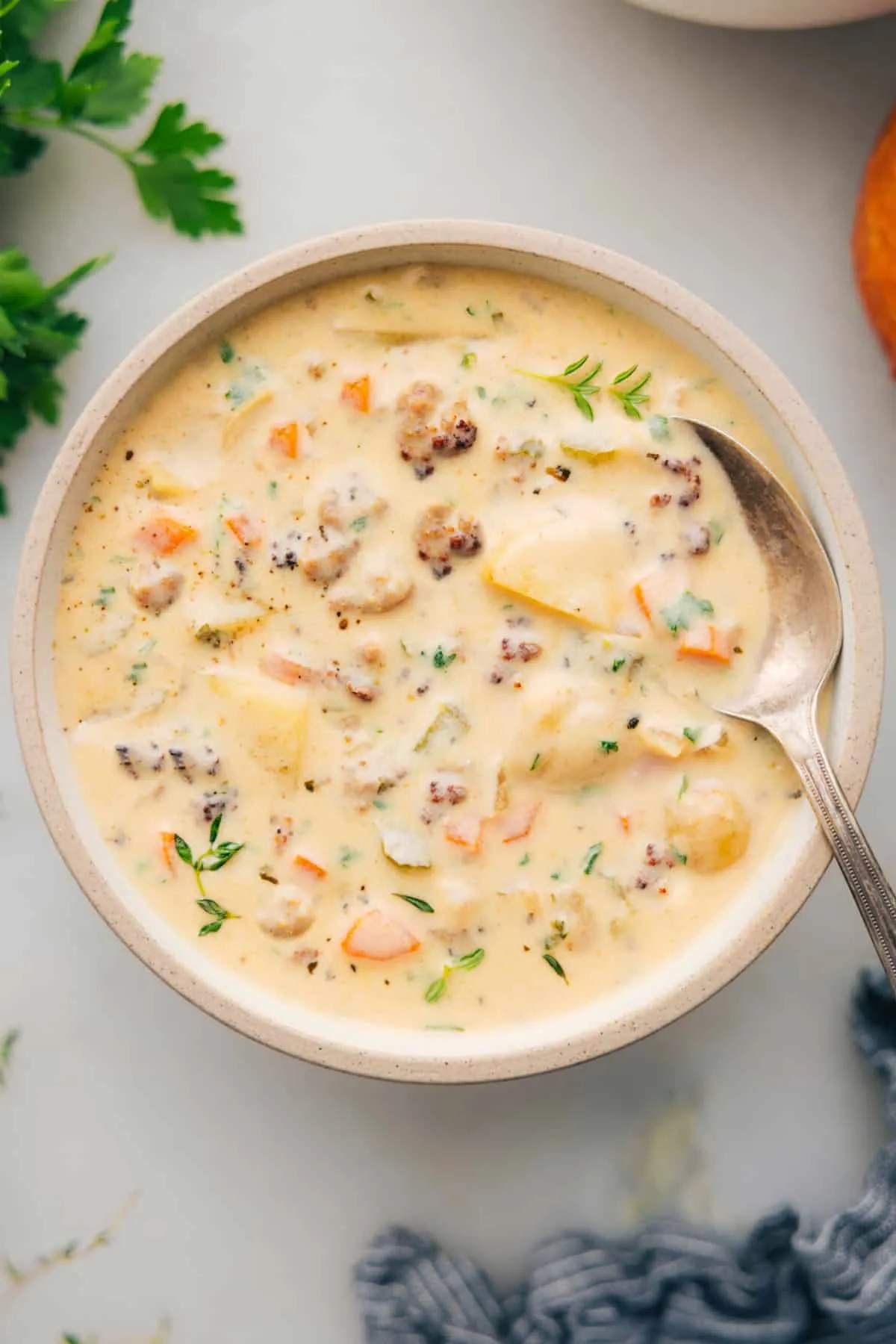 If you love cheeseburger soup, this sausage potato soup is about to become a new favorite. Made with flavorful Italian sausage and sharp Cheddar instead of ground beef and processed cheese, it’s rich, cozy, and perfect for cold weather. A few simple shortcuts — like pre-chopped veggies and leaving the potato skins on — make it even easier to get this creamy, family-friendly soup on the table fast.