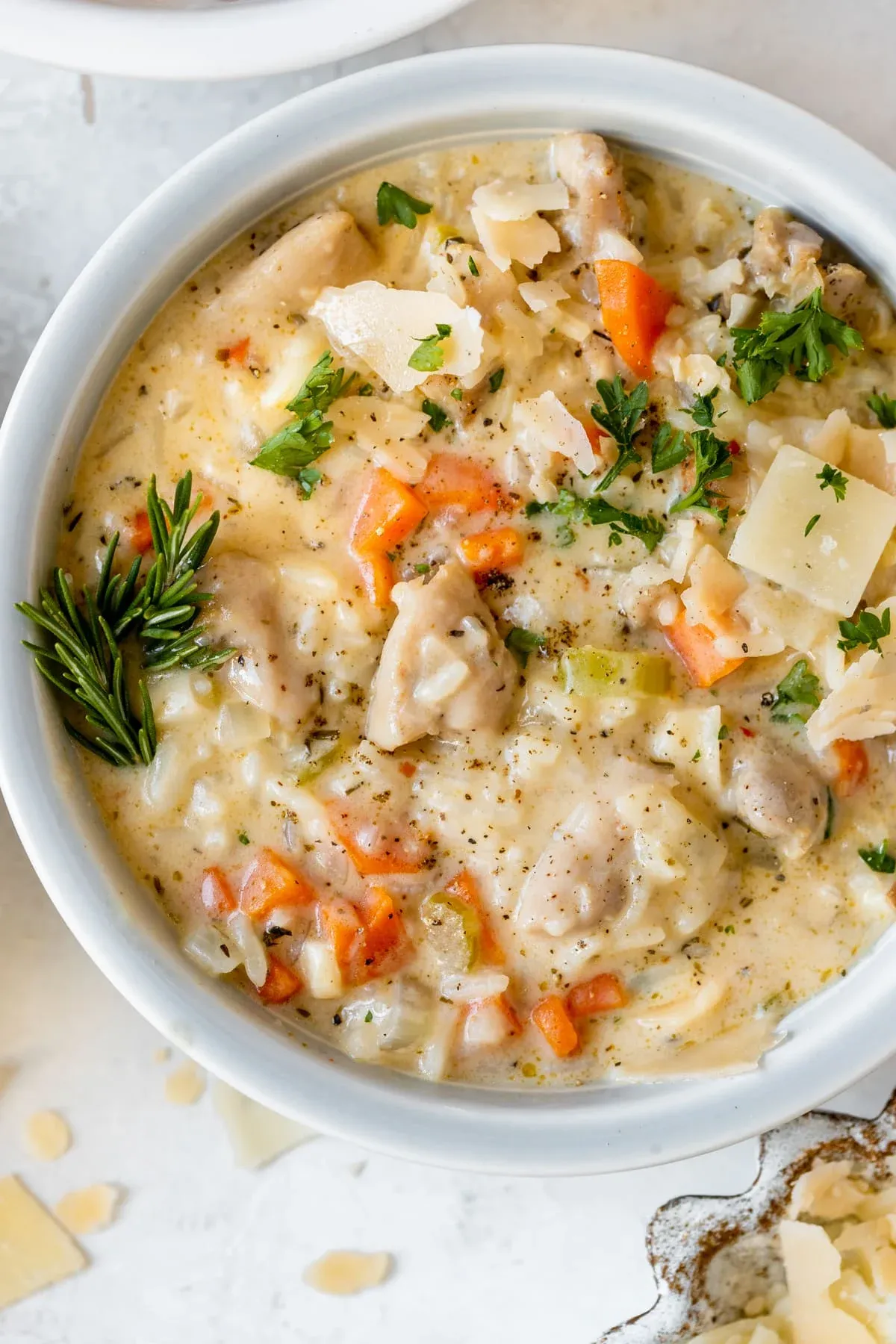 This creamy chicken and rice soup is pure comfort in a bowl and comes together surprisingly fast. Tender chicken, veggies, and rice simmer right in the broth, giving it a naturally thick, rich texture without a lot of extra effort. Cozy, filling, and perfect after a long day, it’s even better topped with a little Parmesan and fresh parsley.
