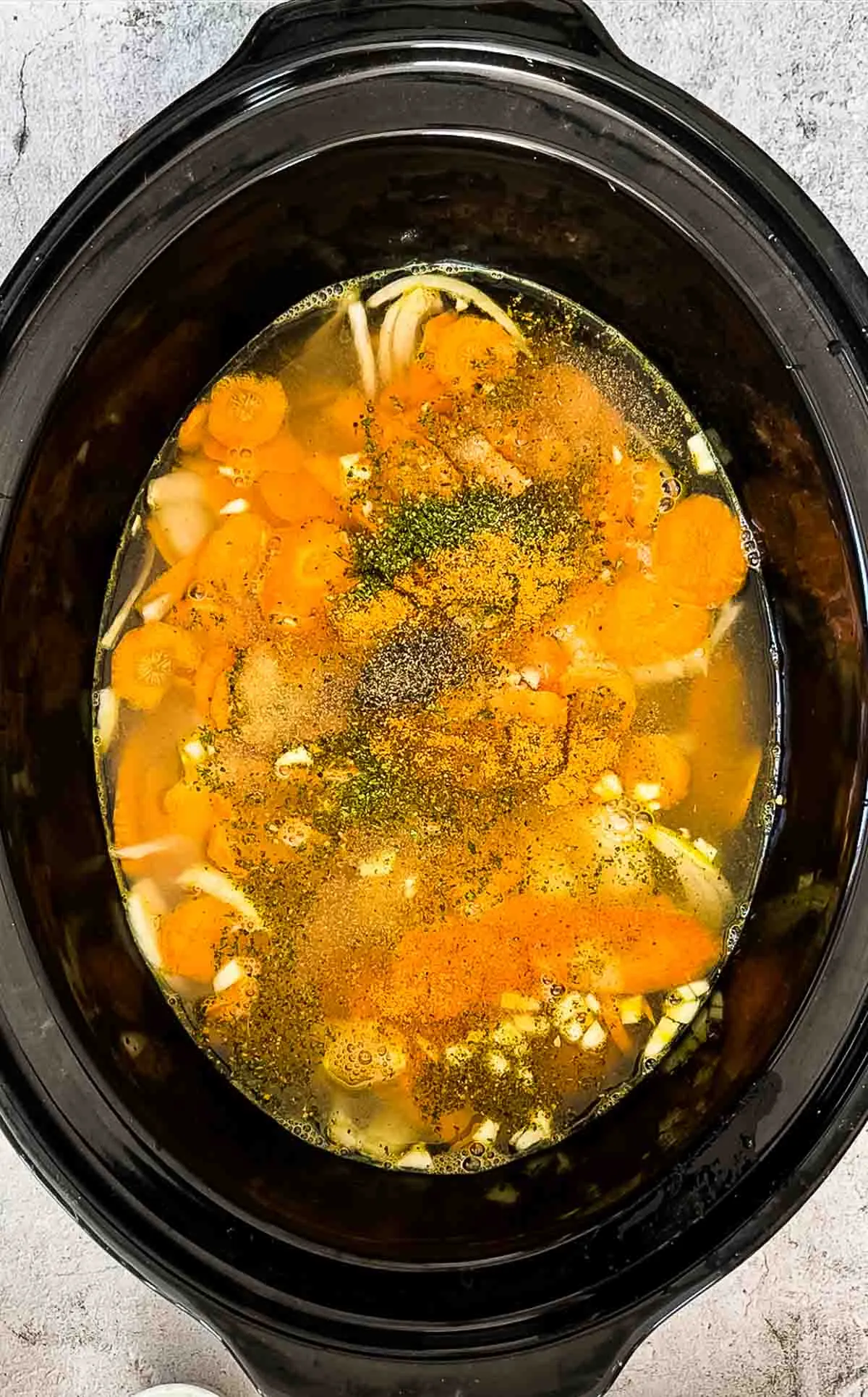 This slow cooker creamy chicken soup with pasta and spinach is smooth, cozy, and full of comforting flavor. Packed with tender chicken, veggies, and pasta, it simmers into a velvety soup that’s perfect for cold days or when you’re feeling a little under the weather. Easy, nourishing, and exactly the kind of bowl you want waiting for you at dinnertime.